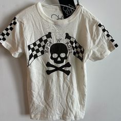 Chaser Kids Rock N Roll Skull Crossbones Tee T-Shirt Size 6 New With Tags Nwt Chaser Rock N Roll Skull Racer Tee Crossbones With Skull, Rock N Roll With Checkered Racing Flags, Checkered Pattern Also On Sleeves Size 6 Color White & Black 100% Cotton White Rock And Roll T-shirt For Streetwear, Rock And Roll White T-shirt For Streetwear, White Cotton Rock And Roll T-shirt, White Rocker T-shirt With Graphic Print, White Rocker Graphic Print T-shirt, White Rocker Style Graphic T-shirt, White Cotton T-shirt Rock And Roll Style, Rock Style Skull Print Crew Neck Top, White Graphic Print Rocker Tops