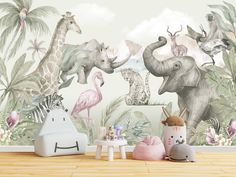 an elephant, giraffe and zebra mural in a children's room with wooden flooring