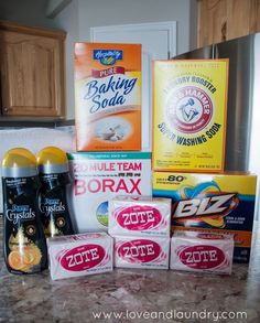 the ingredients for baking are neatly organized on the counter top, including soaps and toothpaste