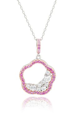 An elegant sterling silver necklace suspends an open flower pendant framed by dainty pink sapphires with lab-created white sapphires for dazzling sparkle. 18" length Sterling silver/pink sapphire/lab-created white sapphire Imported Pink Cubic Zirconia Flower Pendant Necklace, Fine Jewelry Pink Flower Pendant Necklace, Pink Flower Pendant Necklace In Fine Jewelry Style, Pink Flower Pendant Necklace Fine Jewelry, Open Flower, Flower Pendant Necklace, White Sapphire, Flower Pendant, Sterling Silver Necklace