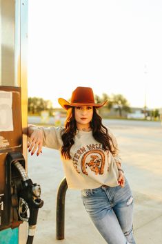 Saddle up and ride into style with our Western Valley Ranch Raw Hem Graphic Sweater! This tee features a rustic and charming design complete with a horseshoe and a cowboy on horseback. Made from soft, high-quality fabric, this tee is as comfortable as it is stylish. Made in the USA Real Turquoise Jewelry, On Horseback, Graphic Sweaters, Real Turquoise, Plus Size Shopping, Dress Romper, Long Sweaters, Hat Hairstyles, Made In The Usa