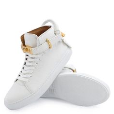 The classic Buscemi White High-Top 100 Alce Belted Leather Sneakers are a versatile Instagram essential. Crafted of premium Italian leather with intricate laces and a durable rubber sole, they offer both timeless appeal and lasting comfort. Made for all-day wear, their striking all-white colorway and bold high-top silhouette will complete any street style look. Calf Leather High-top Sneakers With Perforations, Classic High-top Custom Sneakers With Perforations, Classic High-top Sneakers With Round Toe And Perforations, Classic Lace-up High-top Sneakers With Perforations, Elegant Lace-up Sneakers With White Sole, Designer Leather High-top Sneakers With Textured Sole, Luxury High-top Sneakers With Rubber Sole, Luxury Calf Leather High-top Sneakers With White Sole, Designer Leather Sneakers With Laces