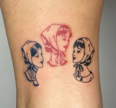 three women's tattoos on the side of their butts, one is wearing a scarf