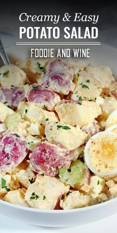 a white bowl filled with potato salad and hard boiled egg