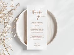 a white plate with a thank you card on it