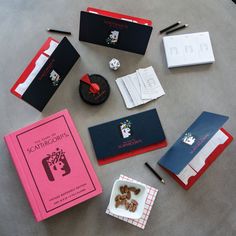 the contents of an assortment of stationery items laid out on top of a table