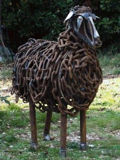 a sculpture of a sheep made out of chains