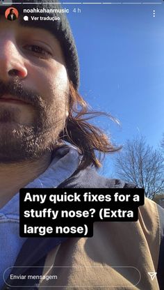 a man with long hair wearing a beanie looking at the camera and texting, any quick fixes for a stuffy nose? extra large nose nose