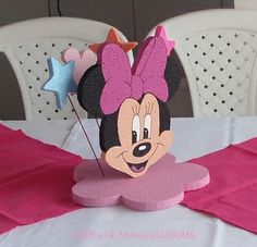 a minnie mouse centerpiece sitting on top of a table