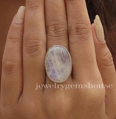 Rainbow Moonstone Ring, 925 Sterling Silver Ring, Healing crystal Ring, Halloween Jewelry, Handmade Silver Ring, Birthday Gift For Sister. Gemstone Name - Rainbow Moonstone . Stone Quality - AAA  Ring Weight - 8.77 gm  Ring Length -2.6 cm Ring Width - 1.8 cm Stone Shape - As shown in the picture. Ring Size - All Ring Size Available.  We serve complete 925 sterling silver Jewelry and genuine properties of the stone.  The products are dispatched from the small business from UK. Product Quality and Packaging - Our all products are 925 Silver Stamped which shows that the product is genuine and authentic .The products are dispatched from the small business from UK so you get the product on time and the product packaging comes in bubble foil wrap with all the precautions taken primarily that you Magical Sterling Silver Crystal Ring For Gift, Mystical Sterling Silver Crystal Ring, Mystical White Crystal Ring In Sterling Silver, Magical Sterling Silver Moonstone Ring Gift, White Mystical Moonstone Ring In Sterling Silver, Handmade Magical Moonstone Ring In Sterling Silver, Mystical White Sterling Silver Rings, Mystical White Moonstone Sterling Silver Ring, Mystical Round Handmade Moonstone Ring