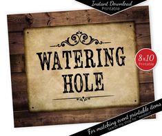 a wooden sign with the words watering hole in black and white lettering on it