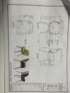 an architectural drawing of a chair and table on top of a piece of white paper