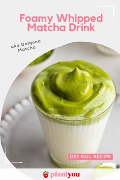 a green smoothie with whipped cream on top and the words, foamy whipped matcha drink