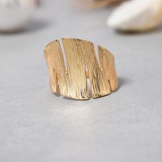 ★14K Solid Gold Textured Ring, 925 Sterling Silver Textured Ring, Dainty Ring, Shell Ring, Mother's Day Gift, Valentine's Day Gift, Christmas Gift★ ▷ MATERIAL ★ All of our 10K, 14K, 18K Jewelry are Solid Gold. ( Not Gold Filled or Gold Plated ) ★ All of our silver jewelry is 925 sterling silver and 14 carat gold plated. (Our white silver jewelry is rhodium plated.) ▷ PRODUCTION AND PACKAGING ★ Our jewelry is handmade. It is specially prepared for you in the dimensions you want upon order. ★ We w Fine Jewelry Hammered Rings For Gift, Polished Finish Wide Band Ring As Gift, Textured Gold Ring, Heart Wedding Rings, Elephant Jewelry, Gold Heart Ring, Sterling Silver Stacking Rings, Silver Heart Ring, Zierlicher Ring