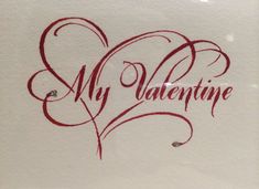 the word my valentine written in red ink