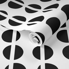 black and white wallpaper with circles on it