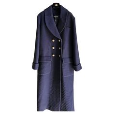 Chanel Wool navy coat. New with tag. 90% wool 10% cashmere 100% silk- lining Size 44. Luxury Long Sleeve Sweater Coat For Formal Occasions, Elegant Navy Outerwear For Office, Chic Wool Peacoat For Formal Occasions, Luxury Formal Sweater Coat For Fall, Luxury Formal Fall Sweater Coat, Formal Luxury Fall Sweater Coat, Luxury Winter Formal Sweater Coat, Luxury Formal Winter Sweater Coat, Elegant Blue Wool Coat