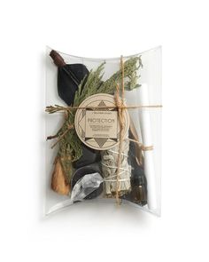 an assortment of herbs and spices wrapped in cellophane