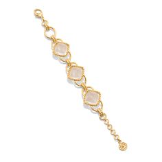 This versatile piece elevates the classic chain bracelet with an unexpected twist, artfully rendered with understated clear quartz beads and a subtly ornate gold motif for a dash of drama. Inspired by the effortless-yet-impeccable style that my fabulous French aunt achieves every day, who is able to take everything from a ballgown to a t-shirt, and make a moment of it. Pair with our Blandine Chain necklace to complete the look. Elegant White Chain Bracelet With Solid Link, Elegant White Chain Bracelet, Elegant Clear Jewelry With Adjustable Chain, Elegant Clear Jewelry With Chain, Elegant White Bracelet With Solid Link Construction, Elegant Gold Faceted Chain Bracelet, Gold Motif, Quartz Beads, Clear Quartz