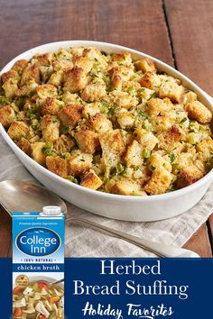 a casserole dish with bread stuffing and holiday tastys on the side