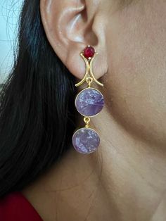 The gorgeous pair of earrings are beautifully handcrafted by our skilled Indian craftsmen in natural gemstones, crystals and gold polish. Pick them up and be ready for your next lunch date  Length of earrings: 6 cms Note: The stones used in the earrings are raw and hence have natural variations There is only one piece of each colour and hence you get the same piece as shown in the picture Fusion Style Round Danglers As Gift, Fusion Style Earrings With Natural Stones As Gift, Fusion Style Earrings With Natural Stones For Gift, Fusion Earrings With Natural Stones For Gift, Fusion Style Drop Earrings As Gift, Elephant Bangle, Stone Necklace Set, Gemstones Crystals, Stylish Earrings