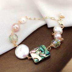 Freshwater Pearl with Black Mother of Pearl Abalone Shell Bracelet in 14k Gold Size Adjustable Abalone Shell Bracelet, Buy Pearls, Pearl Bracelets, Mother Of Pearl Jewelry, Big Pearl, Beaded Jewellery, Freshwater Pearl Bracelet, Shell Bracelet, Pearl Types