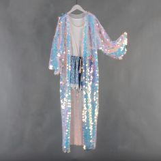 Welcome to my shop, I am in China. It will need around 30 days for international orders. Please consider the time when placing order. Sequin bohemian kimono,perfect for a casual day out. Material: mesh, sequins S size Body width: 27.5 inches(70cm), circle 55 inches(150cm) Shoulder width: 27.5 inches(70cm) Body length:50 inches（127cm） Sleeve length:13 inches（33cm） M size Body width: 31.5 inches(80cm), circle 63 inches(160cm) Shoulder width: 31.5 inches(80cm) Body length:50 inches（127cm） Sleeve le Summer Disco Sequin Dress For Costume Party, Contrast Sequin Dress For Summer Costume Party, Iridescent Sequin Fabric For Spring, Sequin Dress For Summer Festivals, Spring Disco Sequin Dress, Glamorous Sequin Fabric For Summer Costume Party, Summer Long Sleeve Sequin Dress With Contrast, Sequin Dress For Festival And Party Season, Fitted Kimono For Spring Party