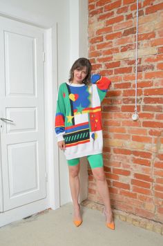 Embrace the nostalgia of the '90s with this stylish long sweater, featuring bold color blocking and geometric patterns that capture the decade's iconic fashion. This cozy, large-sized sweater is perfect for those who appreciate a pop of color and a statement piece in their wardrobe. Its unique design and comfortable fit make it a must-have for any vintage enthusiast looking to stand out in the crowd. - Label: n/a - Era: 1990s - Color: white, multi color - Fabric: 100% cotton - Condition: very go Retro Green Patchwork Sweater, Oversized Retro Winter Sweatshirt, Oversized Green Color Block Sweater, Retro Patchwork Sweater For Spring, Green Oversized Retro Sweater, Retro Patchwork Winter Sweater, Retro Patchwork Sweater For Winter, Green 90s Style Winter Sweater, Green 90s Winter Sweater