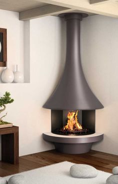 a modern fireplace in the corner of a room