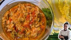 an image of a bowl of food with a chef next to it