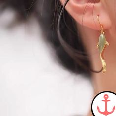 Lucky Fish Earrings - Embrace the Sea and Its Abundance Introducing the enchanting Lucky Fish Earrings, a must-have accessory for passionate lovers of the sea. Our nautical-themed jewelry pieces capture the essence of the deep blue and allow you to carry a piece of the ocean wherever you go. Designed with meticulous attention to detail, these earrings are a perfect addition to any maritime-inspired ensemble. As part of our Fish Earrings collection, the Lucky Fish Earrings stand out with their me Fish Hook Drop Earrings As A Gift, Drop Earrings Jewelry With Fish Hook As Gift, Ocean-inspired Drop Earrings For Gifts, Ocean-inspired Drop Earrings Gift, Ocean-inspired Drop Earrings For Gift, Ocean-inspired Dangle Single Earring, Ocean-inspired Single Earring As Gift, Ocean-inspired Single Dangle Earring, Elegant Gold Fish-shaped Earrings