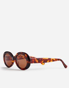 Frame: 95% acetate, 5% brass. Lens: 100% allyl diglycol carbonate. 100% UVA/UVB protection. Imported. Modern Tortoiseshell Glass Sunglasses, Modern Oval Polarized Sunglasses, Modern Oval Sunglasses With Polarized Lenses, Modern Oval Sunglasses With Uva Protection, Modern Acetate Round Frame Sunglasses, Modern Round Frame Acetate Sunglasses, Tortoiseshell Sunglasses With Polarized Glass Lenses, Tortoiseshell Polarized Glass Sunglasses, Round Frame Sunglasses With Gradient Lenses In Acetate