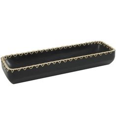 a black tray with gold trimmings on the edge and bottom, sitting on a white background