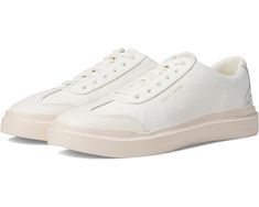 Cole Haan Grandpro Rally Canvas T-Toe Low-top Canvas Sneakers With Removable Insole, Casual Cream Sneakers With Removable Insole, Canvas Sneakers With Removable Insole For Streetwear, Cream Sneakers For Light Sports, Cream Casual Sneakers For Light Sports, Casual Cream Sneakers For Light Sports, White Egret, Heel Caps, White Canvas