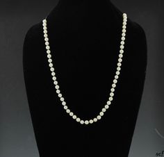 Presented is a beautiful genuine pearl necklace.      The clasp and additional chain is 14k yellow gold and stamped as such.      The pearls are individually knotted and measure about 6.0 mm      Length: 24 inches       The necklace and pearls are in great condition and ready to wear!      Described by: MEM Formal Hand-strung Pearl Necklace With Round Beads, Formal Hand-strung Round Bead Pearl Necklace, Elegant Hand-strung Pearl Necklace For Formal Occasions, Classic 8mm Bead Pearl Necklace For Formal Occasions, Classic Formal Pearl Necklace With 8mm Beads, Formal Pearl Necklace With 8mm Beads, Genuine Pearl Necklace, Pearl Beaded Necklace, Pearl Beads