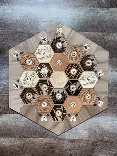 a hexagonal object with many different buttons on it