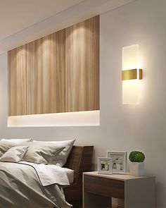 a modern bedroom with white walls and wood paneling on the headboard, along with two bedside tables