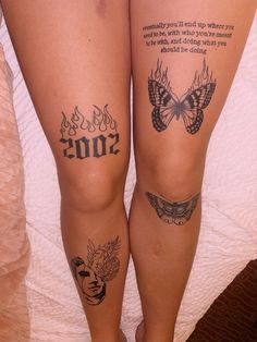 two women with tattoos on their legs