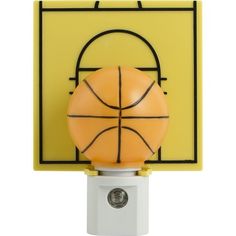 a basketball is mounted to the back of a wall mount with a light on it