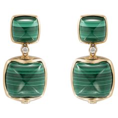 Sweet Sugarloaves! Light and easy to wear these earrings showcase beautiful sugarloaf gemstones accented with a gold frame and diamonds. These earrings are dainty yet have a great pop of color from the vibrant gems. Malachite Sugarloaf Earrings with Diamond in 18 Karat Yellow Gold Malachite: 8.27 carats, 8x8mm size, cushion sugarloaf cabochon, 2 pieces. Malachite: 25.92 carats, 12x12mm size, cushion sugarloaf cabochon, 2 pieces. Diamond: 0.121 carats, round shape, TTLB quality. Gold: 8.86g, 18K Luxury Elegant Malachite Earrings, Butterfly Pin, Naha, Stunning Earrings, Emerald Diamond, Gold Frame, Round Shape, Jewelry Earrings Dangle, Gold Earrings