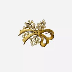 Crown Trifari Faux Pearl Bow Brooch Flower Floral Spray GoldTone Vintage | eBay Elegant Spring Gift Brooches, Elegant Spring Brooch Jewelry, Elegant Spring Brooch, Elegant Gold Brooches For Spring, Gold Wedding Brooches Chic Style, Chic Gold Wedding Brooch, Gold Wedding Brooches In Chic Style, Gold Chic Wedding Brooches, Chic Gold Wedding Brooches