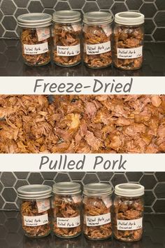 four jars filled with food sitting on top of a counter