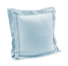 a light blue pillow on a white background