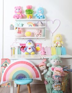 there are stuffed animals and toys on the shelves in this room, along with other items