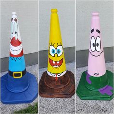 three different colored cones with cartoon faces on them