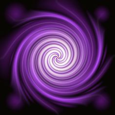 an image of a purple swirl in the dark