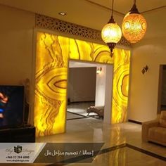 a living room filled with furniture and a flat screen tv