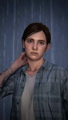 the last of us character is shown with tattoos on her arm and chest, standing in front of a blue wall