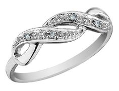 a white gold ring with diamonds in the middle and an intertwined design on top