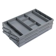 a gray plastic box with compartments on it